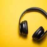 The Future of Listening: Share Audio Like Never Before 2 flatlay photography of wireless headphones
