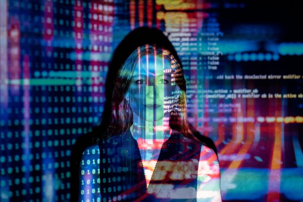 Sora and Nano Banana Pro Face Throttling as Demand Surges 5 A woman with digital code projections on her face, representing technology and future concepts.