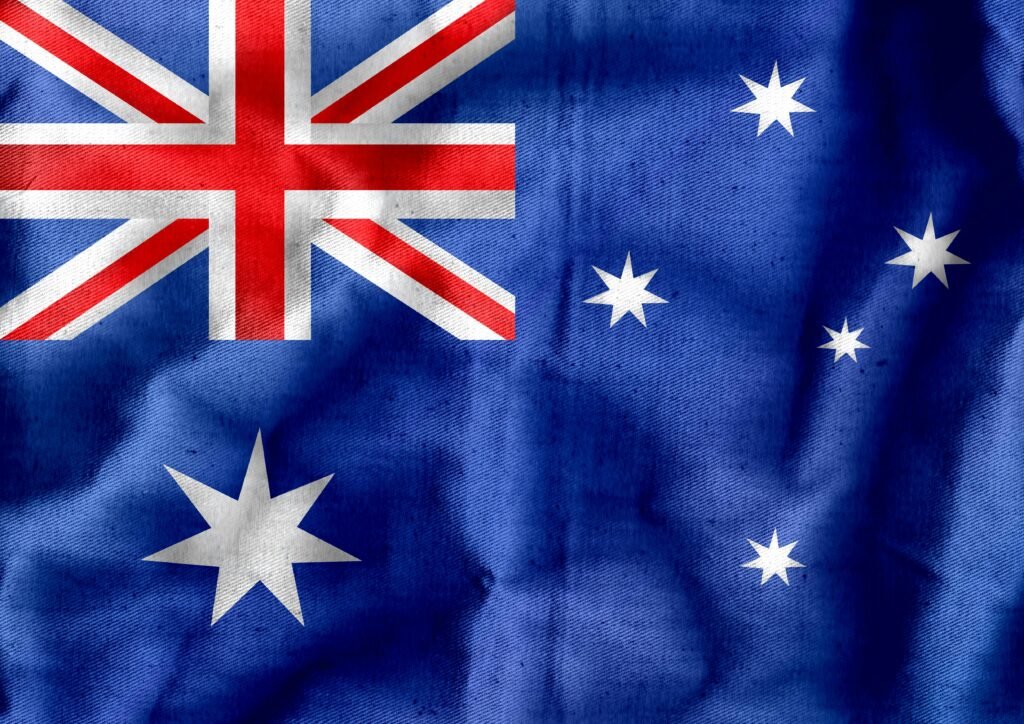 Australian PM Anthony Albanese Marries at 62 — Dog Toto Steals the Spotlight in a Joyful Celebration, Nation Applauds 3 Vibrant detailed texture of the Australian flag with stars and Union Jack.