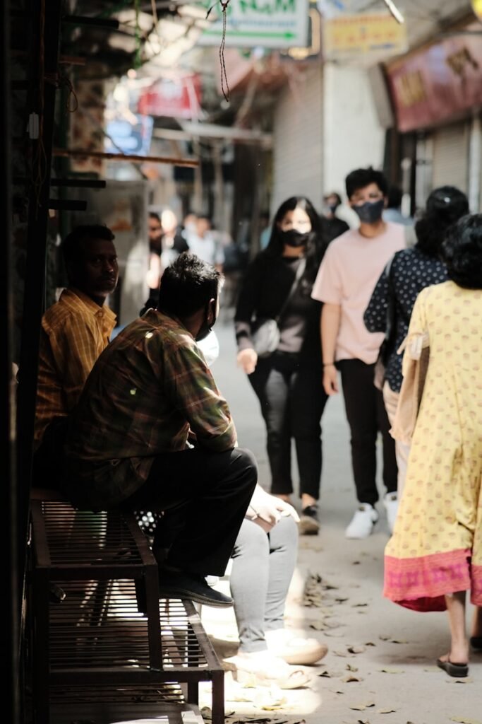 Delhi Air Goes From “Very Poor” to “Absolutely Legendary,” GRAP-3 Steps In Like a Concerned Parent 2 a group of people walking down a street