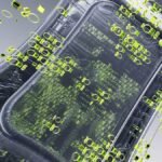 a cell phone with a lot of green dots on it